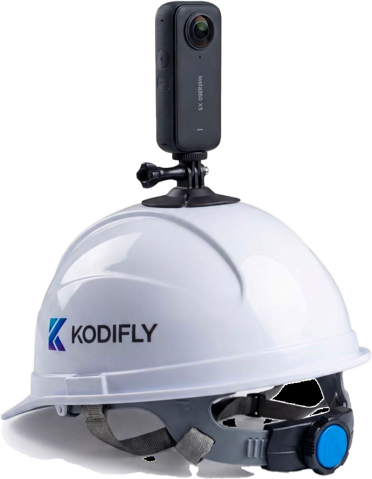 A hard hat with a 360 camera mounted on top, used to capture a site walk